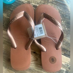 New with tag, Havaianas flip-flops size 8 rust red brown color